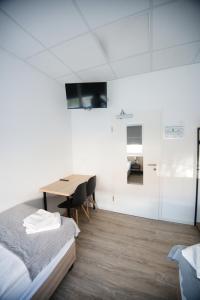 Postel nebo postele na pokoji v ubytování Hostel Messe Laatzen