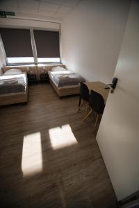 Postel nebo postele na pokoji v ubytování Hostel Messe Laatzen