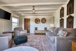 a living room with a couch and chairs at Tesuque Outpost Casita E & F Best views in Santa Fe in Santa Fe