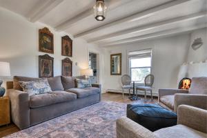 a living room with a couch and a table at Tesuque Outpost Casita E & F Best views in Santa Fe in Santa Fe +61 photos