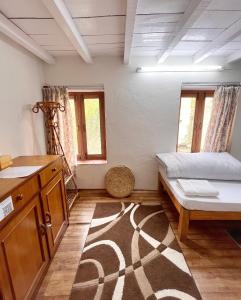 Letto o letti in una camera di Jhigu Homestay Patan