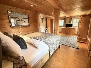 TV a/nebo společenská místnost v ubytování CHALET BELLE WILD by Belle Stay