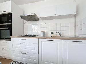 Η κουζίνα ή μικρή κουζίνα στο Appartement Cosy Florange +16 φωτογραφίες