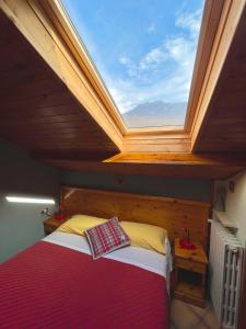 Voodi või voodid majutusasutuse Hotel Carrara toas +37 fotot