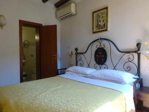 Postel nebo postele na pokoji v ubytování Hotel Minerva & Nettuno di Venezia