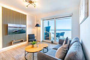 Ein Sitzbereich in der Unterkunft Strandallee - Ferienapartments direkt am Strand von Haffkrug