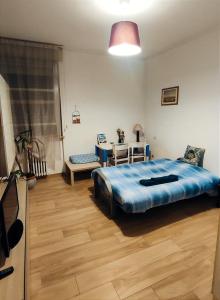 A bed or beds in a room at Tramway Easy Private Rooms - Casa all'Italiana