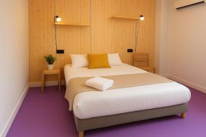 Postel nebo postele na pokoji v ubytování Koala Hostel Mercado