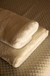 a piece of brown towel sitting on a table at Villa Aldena Luxury Residence in Sivota