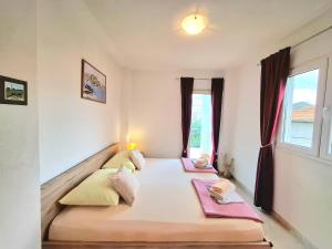 Postel nebo postele na pokoji v ubytování Cozy 1-bedroom apartment near the center of Trogir