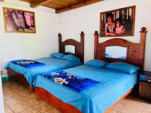 Postel nebo postele na pokoji v ubytování Hotel y Rest. las Cristalinas