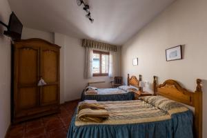 Postel nebo postele na pokoji v ubytování Casa Samarra