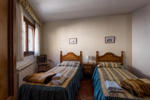 Postel nebo postele na pokoji v ubytování Casa Samarra