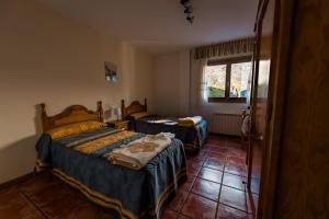 Postel nebo postele na pokoji v ubytování Casa Samarra