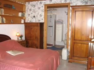 Postel nebo postele na pokoji v ubytování L'ore Du Bois - Maison D'hôtes