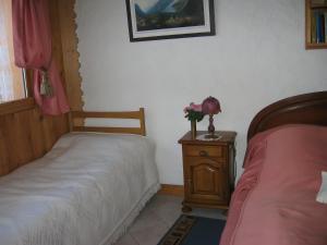 Postel nebo postele na pokoji v ubytování L'ore Du Bois - Maison D'hôtes