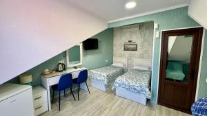 Postel nebo postele na pokoji v ubytování Nicolas Boutique Hotel
