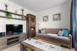 TV a/nebo společenská místnost v ubytování Haus Klaus Joy