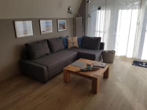 O zonă de relaxare la Ferienhaus Ankerplatz In Börgerende Rethwisch