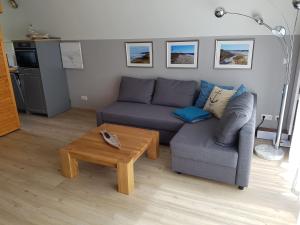 O zonă de relaxare la Ferienhaus Ankerplatz In Börgerende Rethwisch