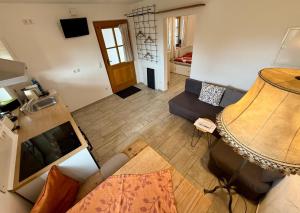 an overhead view of a living room with a couch at Ferienwohnung Jahnel in Waging am See +3 photos