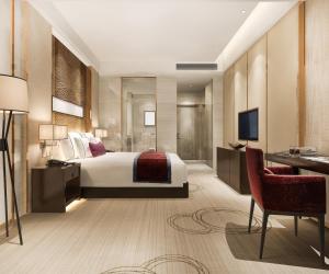 Postel nebo postele na pokoji v ubytování Hotel Classic Plaza At Delhi Airport