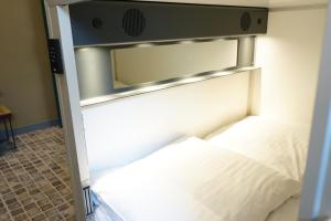 Postel nebo postele na pokoji v ubytování Sunflower Hostel Berlin