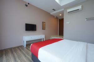TV a/nebo společenská místnost v ubytování New Bangi Gateway Hotel