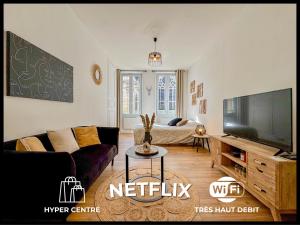 TV a/nebo společenská místnost v ubytování Ô Centre- Chaleureux - Fibre - Netflix