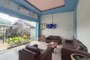 Istumisnurk majutusasutuses OYO 92207 Hotel Koperasi