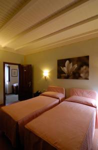 Ένα ή περισσότερα κρεβάτια σε δωμάτιο στο Locanda San Barnaba