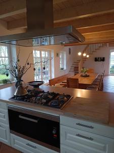 Kuchyň nebo kuchyňský kout v ubytování Ferienhaus Moorzauber