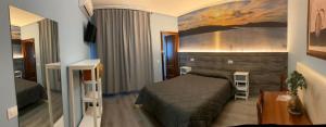Posteľ alebo postele v izbe v ubytovaní Hostal imperio