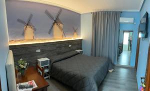 Posteľ alebo postele v izbe v ubytovaní Hostal imperio