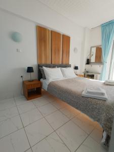 Postel nebo postele na pokoji v ubytování Atlas-Unlimited Sea View Apartment