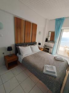 Postel nebo postele na pokoji v ubytování Atlas-Unlimited Sea View Apartment