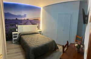 Posteľ alebo postele v izbe v ubytovaní Hostal imperio
