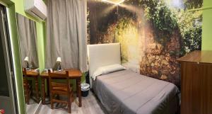 Posteľ alebo postele v izbe v ubytovaní Hostal imperio