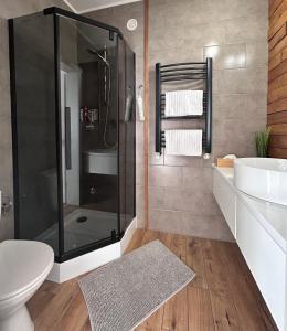 Kúpeľňa v ubytovaní Apartament w Centrum