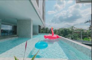 Bazén v ubytování Carrara Hotel Hatyai nebo v jeho okolí