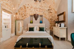 Postel nebo postele na pokoji v ubytování Relais La Casa del Poeta