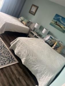 Postel nebo postele na pokoji v ubytování Reel Love