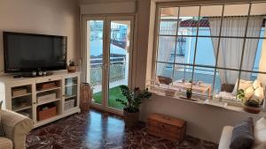 TV a/nebo společenská místnost v ubytování larisa4seasons