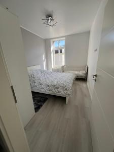 Postel nebo postele na pokoji v ubytování Renoviertes Appartment mit 2 Schlafzimmern