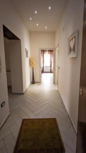 En eller flere senge i et værelse på La casa di nonna Maria + 21 billeder