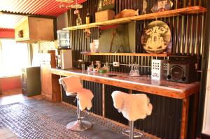 Lounge alebo bar v ubytovaní ZOE LODGE
