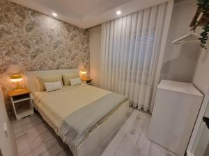 Ένα ή περισσότερα κρεβάτια σε δωμάτιο στο Central Location 2 Bedroom Apt