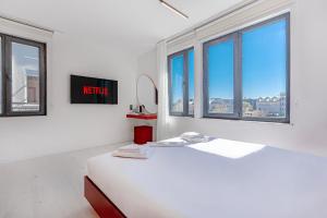 TV a/nebo společenská místnost v ubytování Tulii Rooms