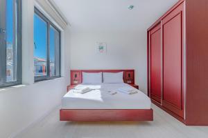 Postel nebo postele na pokoji v ubytování Tulii Rooms