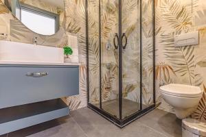 Koupelna v ubytování Tulii Rooms